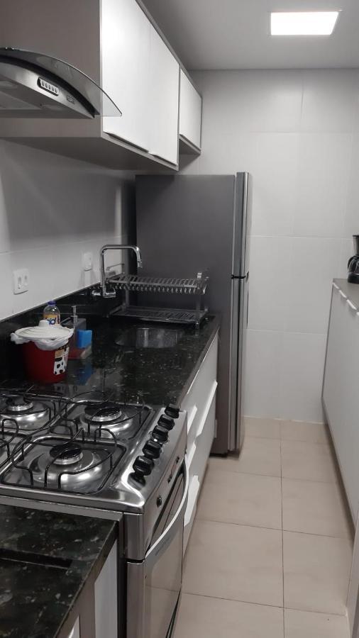 Flat em Pitangueiras - sacada gourmet, 3 dorms, limpeza diária e serv de praia Guarujá Exterior foto