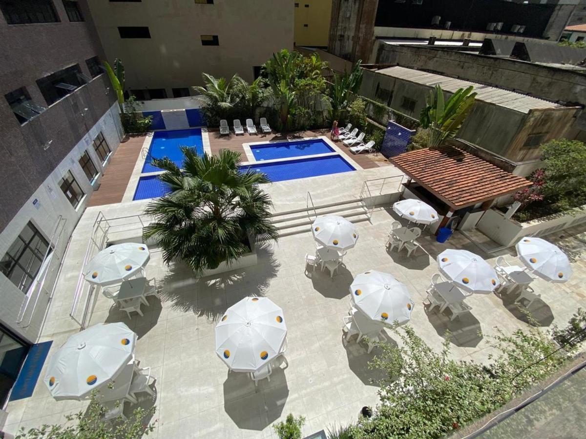 Flat em Pitangueiras - sacada gourmet, 3 dorms, limpeza diária e serv de praia Guarujá Exterior foto