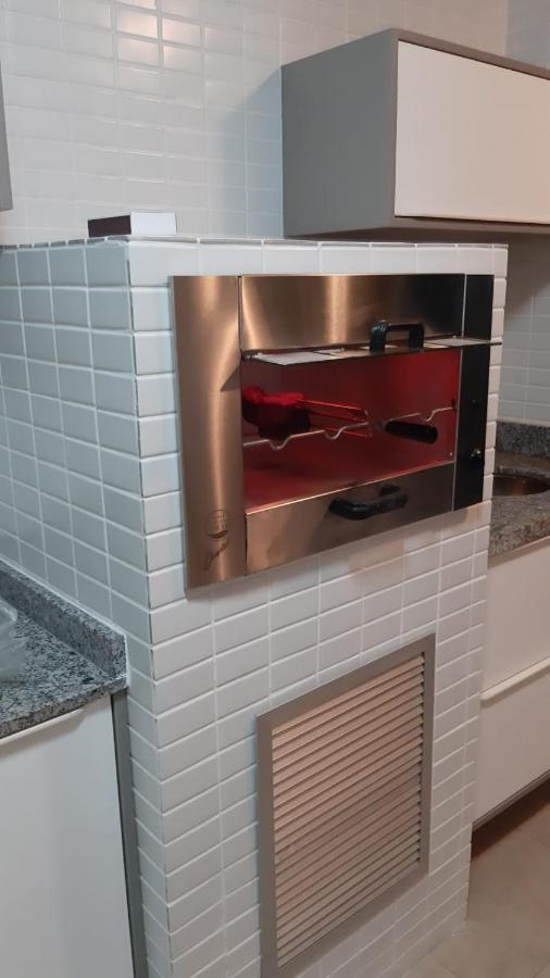 Flat em Pitangueiras - sacada gourmet, 3 dorms, limpeza diária e serv de praia Guarujá Exterior foto