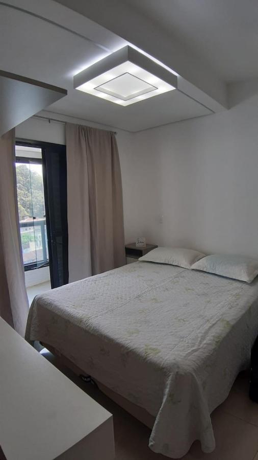 Flat em Pitangueiras - sacada gourmet, 3 dorms, limpeza diária e serv de praia Guarujá Exterior foto