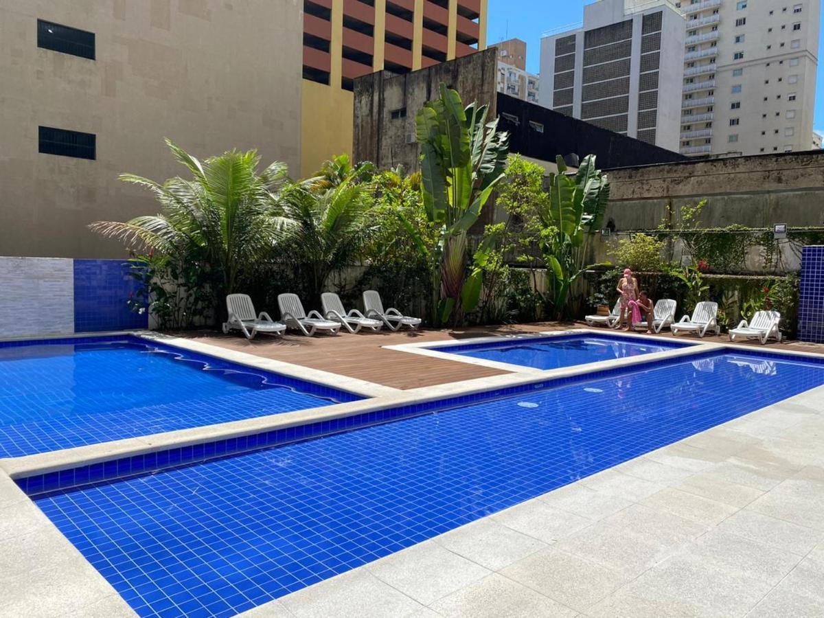 Flat em Pitangueiras - sacada gourmet, 3 dorms, limpeza diária e serv de praia Guarujá Exterior foto
