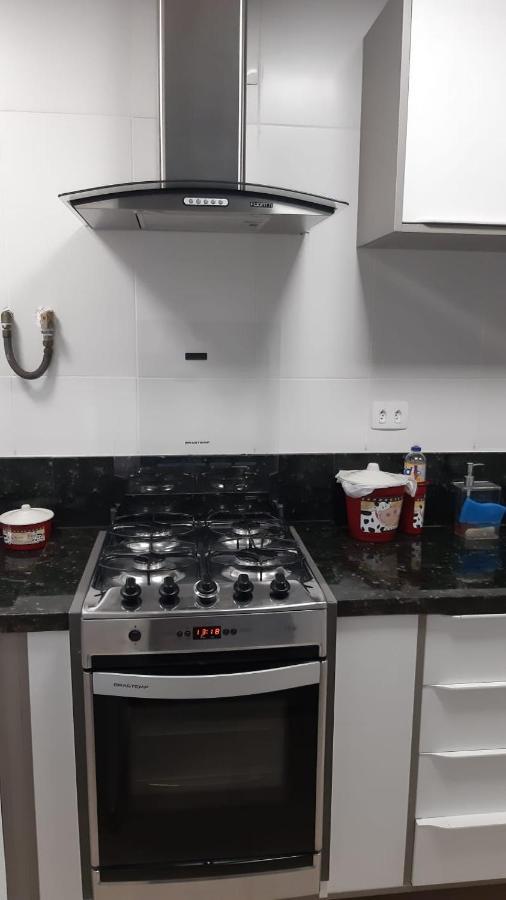 Flat em Pitangueiras - sacada gourmet, 3 dorms, limpeza diária e serv de praia Guarujá Exterior foto